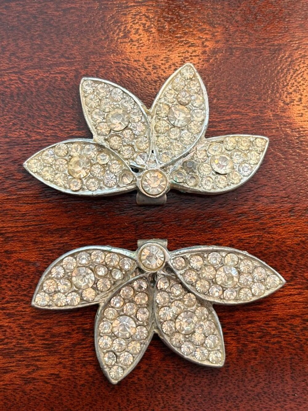 Pair of vintage rhinestone-encrusted floral brooches w/ metal backing